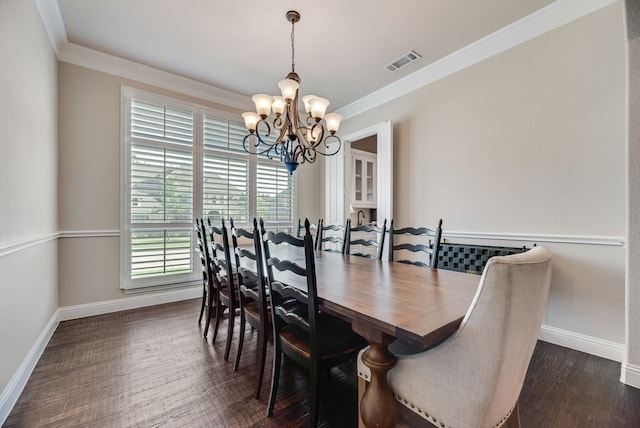 901 Jessica Ln, Prosper, TX 75078 - dining area with a chandelier, crown molding, baseboards, and dark wood-style flooring