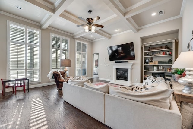 901 Jessica Ln, Prosper, TX 75078 - living room featuring a glass covered fireplace, coffered ceiling, beam ceiling, dark wood finished floors, and a ceiling fan