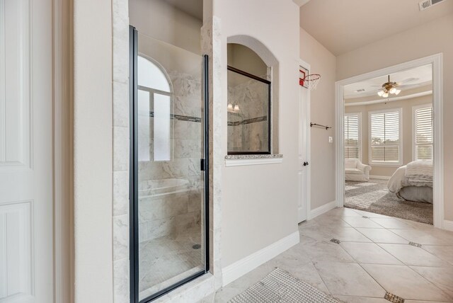 901 Jessica Ln, Prosper, TX 75078 - full bathroom featuring a stall shower, baseboards, ensuite bathroom, tile patterned flooring, and ceiling fan