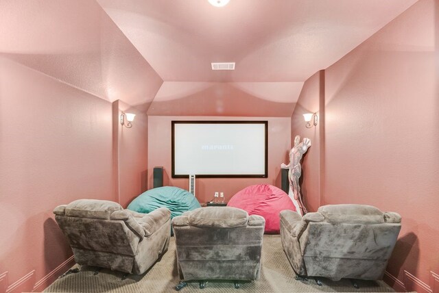 901 Jessica Ln, Prosper, TX 75078 - carpeted cinema room featuring lofted ceiling and baseboards