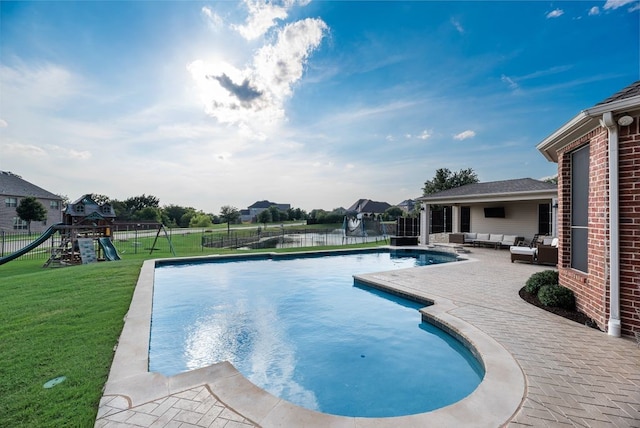 901 Jessica Ln, Prosper, TX 75078 - view of swimming pool with outdoor lounge area, a patio area, and a playground