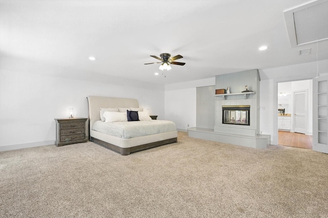 1189 W Jeter Rd, Bartonville, TX 76226 - carpeted bedroom featuring attic access, recessed lighting, a fireplace, and a ceiling fan