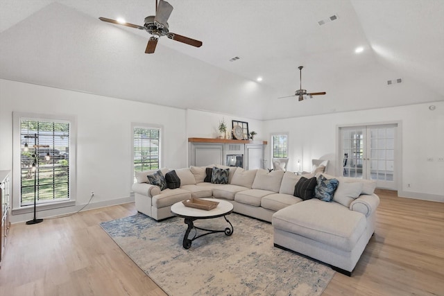 1189 W Jeter Rd, Bartonville, TX 76226 - living room featuring a ceiling fan, light wood-style flooring, plenty of natural light, and high vaulted ceiling