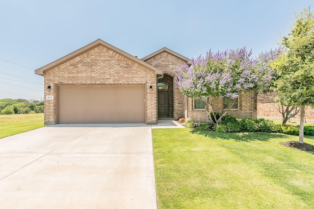 812 Holler Loop, Fort Worth, TX 76247 - ranch-style home with a garage, brick siding, driveway, and a front lawn
