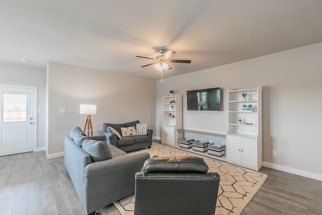 812 Holler Loop, Fort Worth, TX 76247 - living room featuring ceiling fan, light wood finished floors, and baseboards