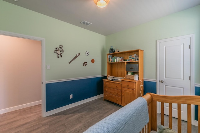 812 Holler Loop, Fort Worth, TX 76247 - bedroom with wood finished floors and baseboards