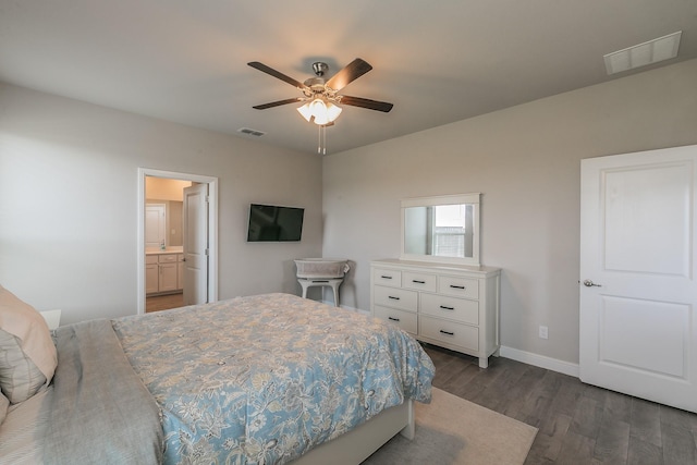 812 Holler Loop, Fort Worth, TX 76247 - bedroom featuring dark wood-style floors, baseboards, ceiling fan, and ensuite bathroom