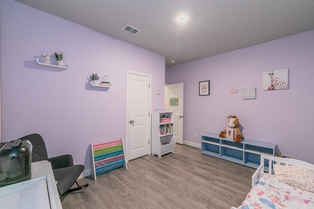 812 Holler Loop, Fort Worth, TX 76247 - bedroom with light wood finished floors and baseboards