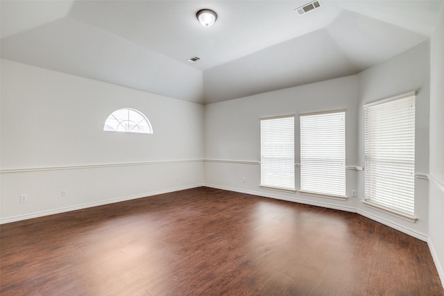 5283 W Cove Way, Grand Prairie, TX 75052 - empty room with lofted ceiling, dark wood-style flooring, and baseboards
