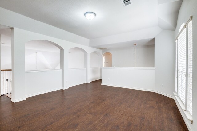 5283 W Cove Way, Grand Prairie, TX 75052 - empty room with dark wood finished floors, plenty of natural light, and baseboards
