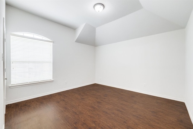 5283 W Cove Way, Grand Prairie, TX 75052 - additional living space featuring plenty of natural light, dark wood-type flooring, lofted ceiling, and baseboards