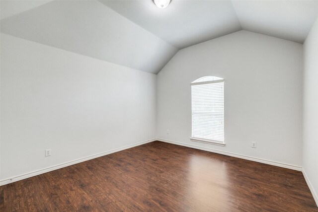 5283 W Cove Way, Grand Prairie, TX 75052 - additional living space featuring lofted ceiling, dark wood-style floors, and baseboards
