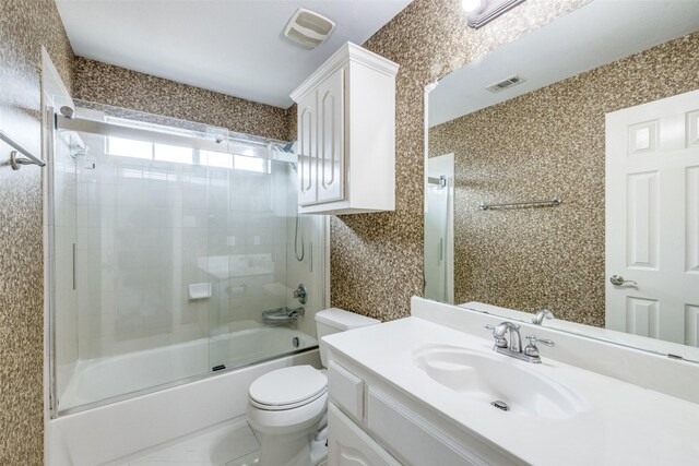 5283 W Cove Way, Grand Prairie, TX 75052 - full bath with enclosed tub / shower combo, vanity, and toilet