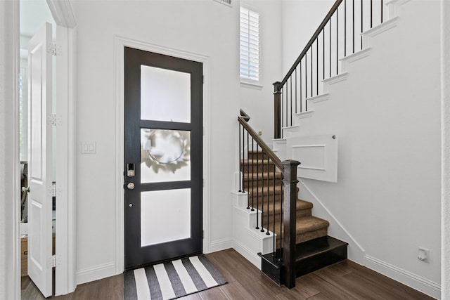 1720 Rolling Heights Ln, Fort Worth, TX 76008 - foyer featuring dark wood-style flooring, baseboards, stairway, and a high ceiling