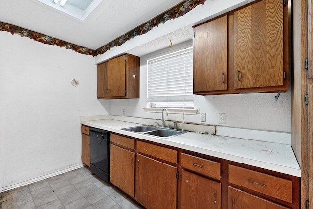 8512 Whitney Dr, White Settlement, TX 76108 - kitchen with a sink, black dishwasher, light countertops, and brown cabinets