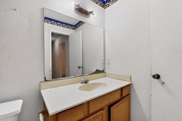 8512 Whitney Dr, White Settlement, TX 76108 - bathroom featuring toilet and vanity