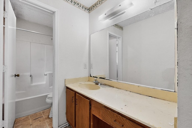 8512 Whitney Dr, White Settlement, TX 76108 - bathroom featuring vanity, toilet, and washtub / shower combination