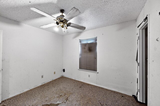8512 Whitney Dr, White Settlement, TX 76108 - spare room featuring a ceiling fan and a textured ceiling