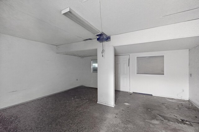8512 Whitney Dr, White Settlement, TX 76108 - garage featuring a garage door opener