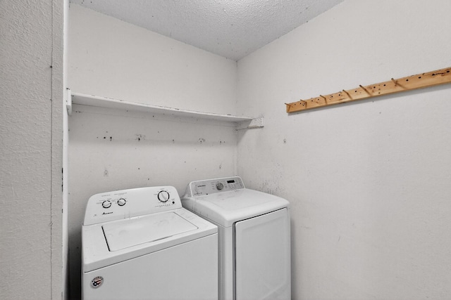 8512 Whitney Dr, White Settlement, TX 76108 - laundry area featuring separate washer and dryer and a textured ceiling