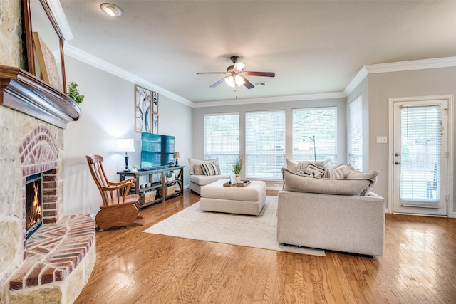 105 Cassandra Dr, Forney, TX 75126 - living area featuring ceiling fan, a fireplace, wood finished floors, and crown molding