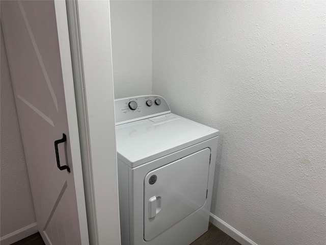 14800 Enterprise Dr Unit 17B, Farmers Branch, TX 75234 - washroom with washer / dryer, baseboards, and dark wood-type flooring