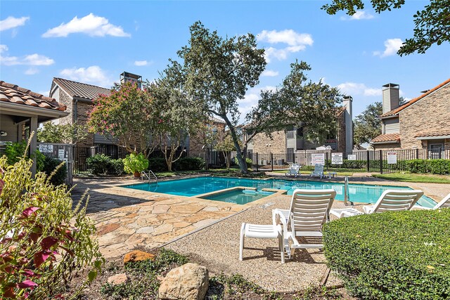14800 Enterprise Dr Unit 17B, Farmers Branch, TX 75234 - view of pool with a patio and a pool with connected hot tub