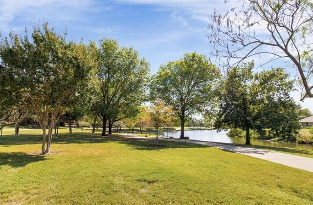14800 Enterprise Dr Unit 17B, Farmers Branch, TX 75234 - view of community with a water view and a yard
