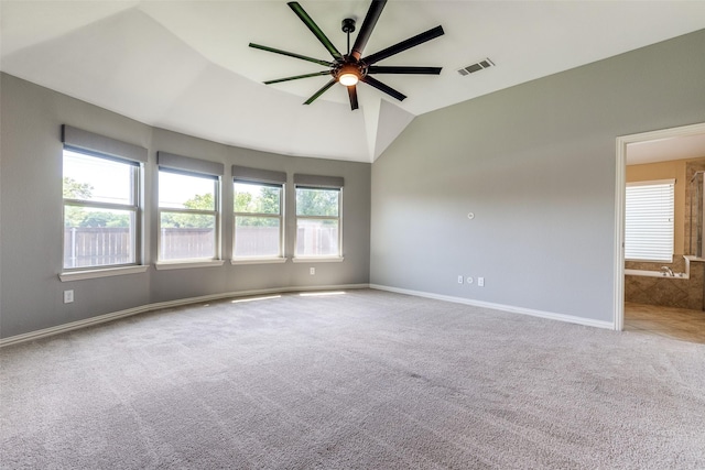 9728 Bitterroot Dr, Little Elm, TX 75068 - empty room featuring a ceiling fan, carpet floors, and lofted ceiling