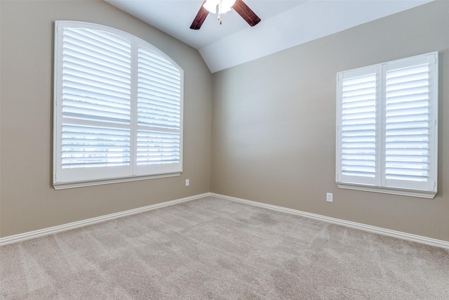 9728 Bitterroot Dr, Little Elm, TX 75068 - carpeted empty room featuring ceiling fan, plenty of natural light, and vaulted ceiling