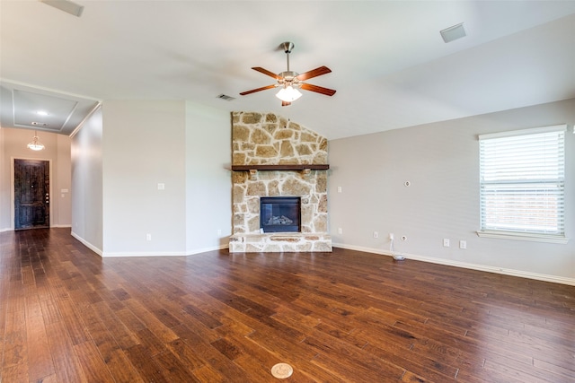 9728 Bitterroot Dr, Little Elm, TX 75068 - unfurnished living room with ceiling fan, wood finished floors, a stone fireplace, and lofted ceiling