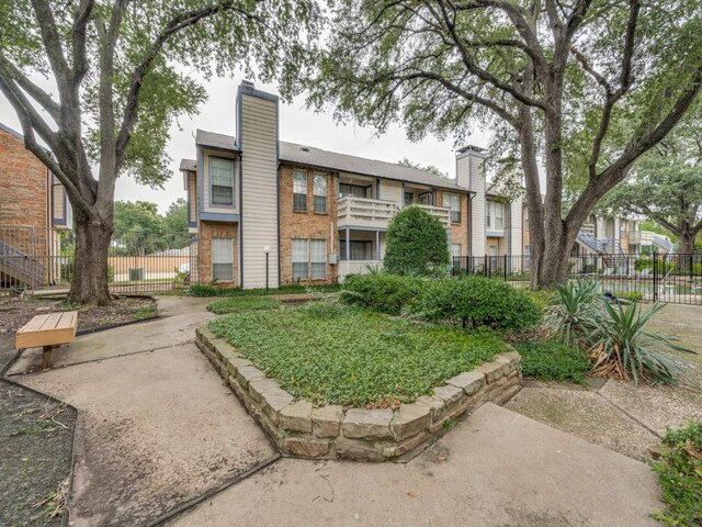1603 Marsh Ln Unit 308, Carrollton, TX 75006 - view of building exterior