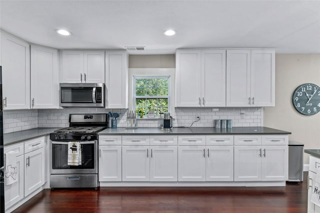 1105 Florence St, Mckinney, TX 75069 - kitchen featuring appliances with stainless steel finishes, dark countertops, white cabinetry, tasteful backsplash, and recessed lighting