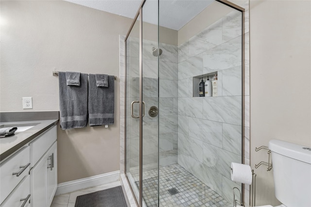1105 Florence St, Mckinney, TX 75069 - bathroom featuring vanity, a shower stall, toilet, and baseboards