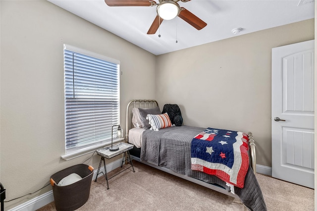 1105 Florence St, Mckinney, TX 75069 - carpeted bedroom with multiple windows, baseboards, and ceiling fan