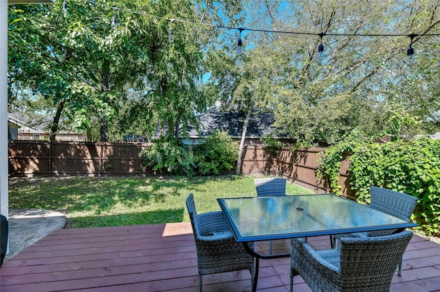 1105 Florence St, Mckinney, TX 75069 - wooden deck with outdoor dining area