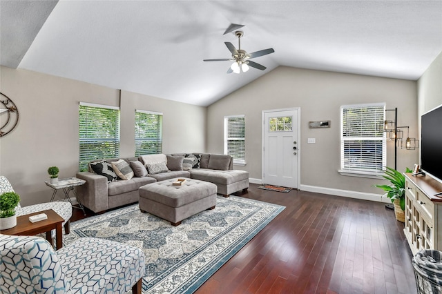1105 Florence St, Mckinney, TX 75069 - living room with a ceiling fan, vaulted ceiling, dark wood-type flooring, and baseboards