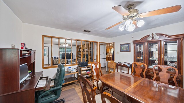1133 Vz County Road 2205, Canton, TX 75103 - dining space featuring ceiling fan, wood finished floors, and a desk