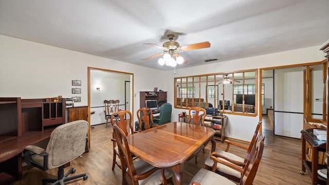 1133 Vz County Road 2205, Canton, TX 75103 - dining room with an office area, a ceiling fan, and wood finished floors