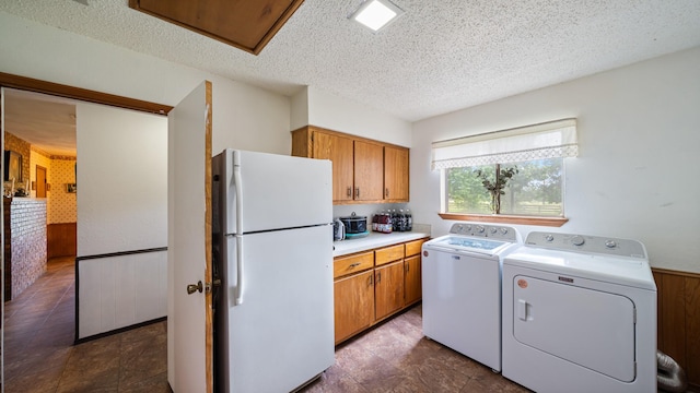 1133 Vz County Road 2205, Canton, TX 75103 - washroom featuring independent washer and dryer and a textured ceiling