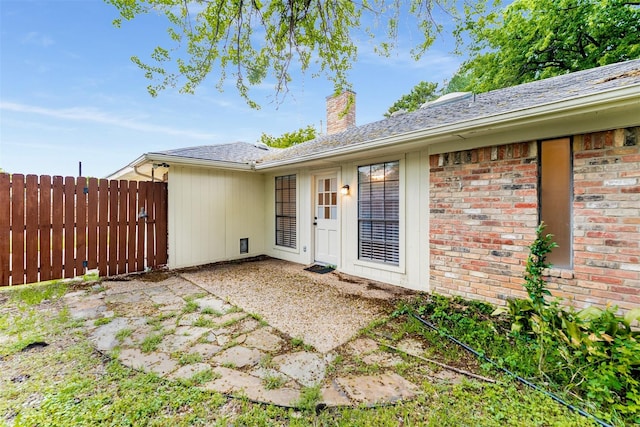 5008 Hatherly Dr, Plano, TX 75023 - rear view of house featuring a chimney, a patio, and brick siding