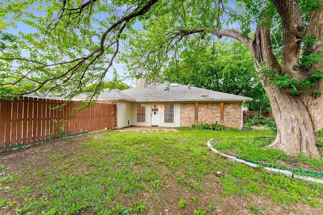 5008 Hatherly Dr, Plano, TX 75023 - rear view of house featuring a chimney and brick siding