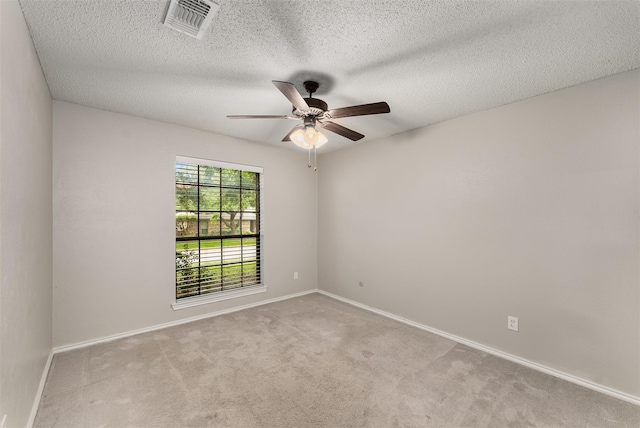 5008 Hatherly Dr, Plano, TX 75023 - spare room with a ceiling fan, carpet, baseboards, and a textured ceiling