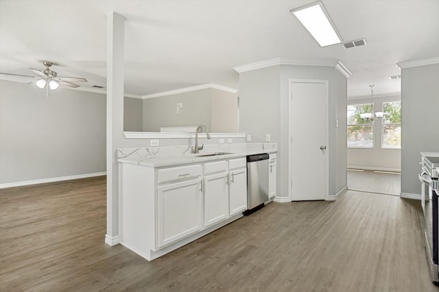 1713 Harvest Crossing Dr, Wylie, TX 75098 - kitchen featuring stainless steel dishwasher, a sink, crown molding, light countertops, and wood finished floors