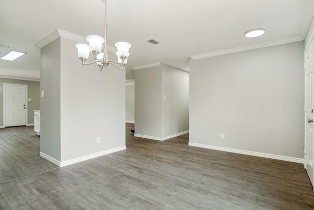 1713 Harvest Crossing Dr, Wylie, TX 75098 - spare room with crown molding, wood finished floors, a chandelier, and baseboards