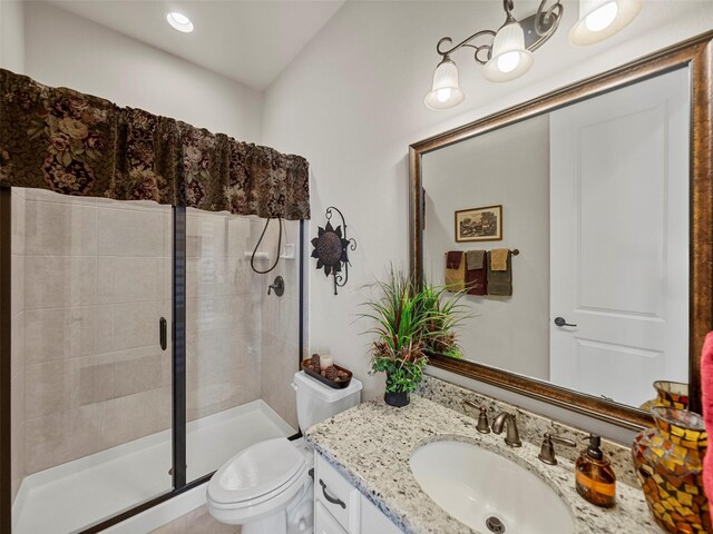 6420 Rosemary Ct, Mckinney, TX 75071 - bathroom with vanity, a shower stall, toilet, and recessed lighting