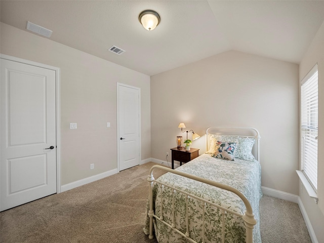 6420 Rosemary Ct, Mckinney, TX 75071 - bedroom featuring light colored carpet, vaulted ceiling, and baseboards