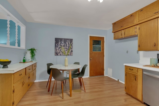 305 Wofford Way, Saginaw, TX 76179 - dining area featuring light wood-type flooring and baseboards
