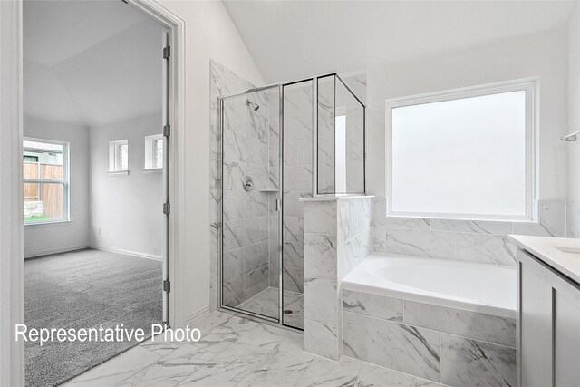 2401 Ridgecrest Ln, Sherman, TX 75092 - bathroom featuring marble look tile flooring, a garden tub, vaulted ceiling, a marble finish shower, and vanity
