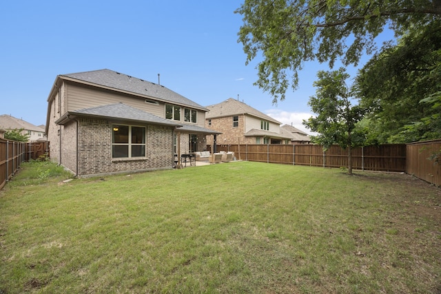 7717 Lake Worth Cv, Mckinney, TX 75071 - back of house with outdoor lounge area, brick siding, and a patio